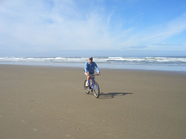 Bob biking on beach