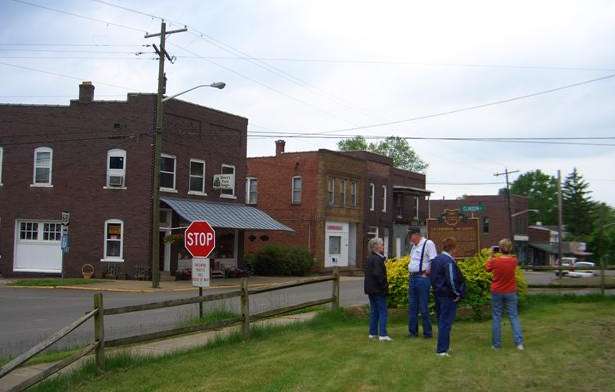 Standing on the spot where their great-great grandfathers store once stood.