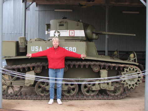 Model in front of American tank