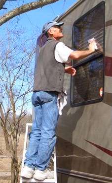 Bob washing windows as ordered