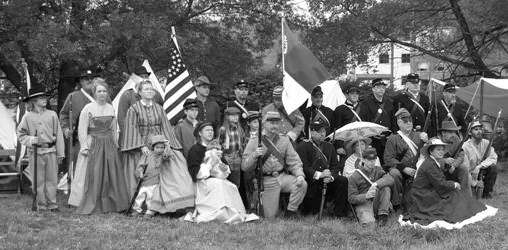 The actors assemble to pose for a photo