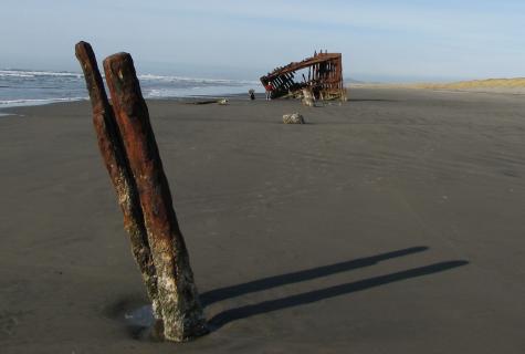 Rusting hulk, end on